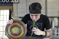 Watch Matt Stonie Nearly Unravel Eating Too Much Fruit By The Foot